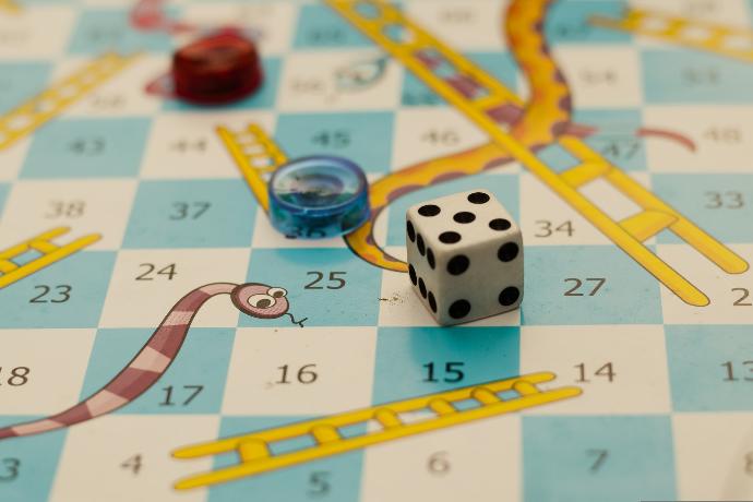 a close up of a board game with dices